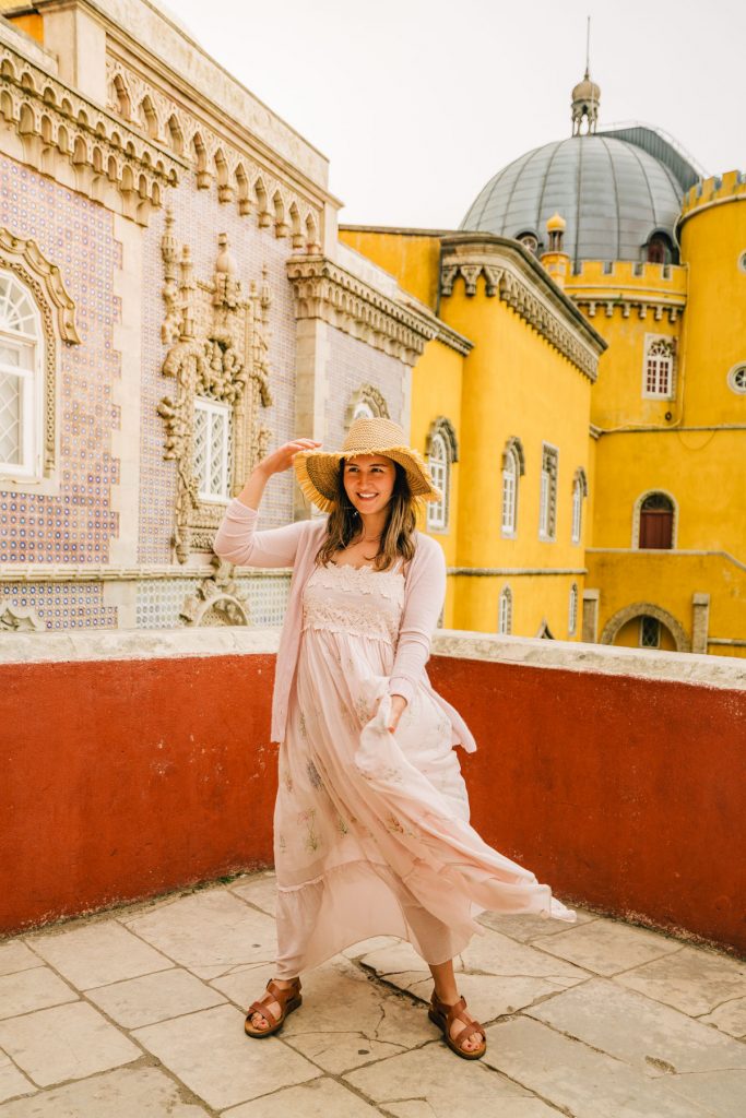 Ornate arched walkway inside the Pena Palace courtyard in Sintra