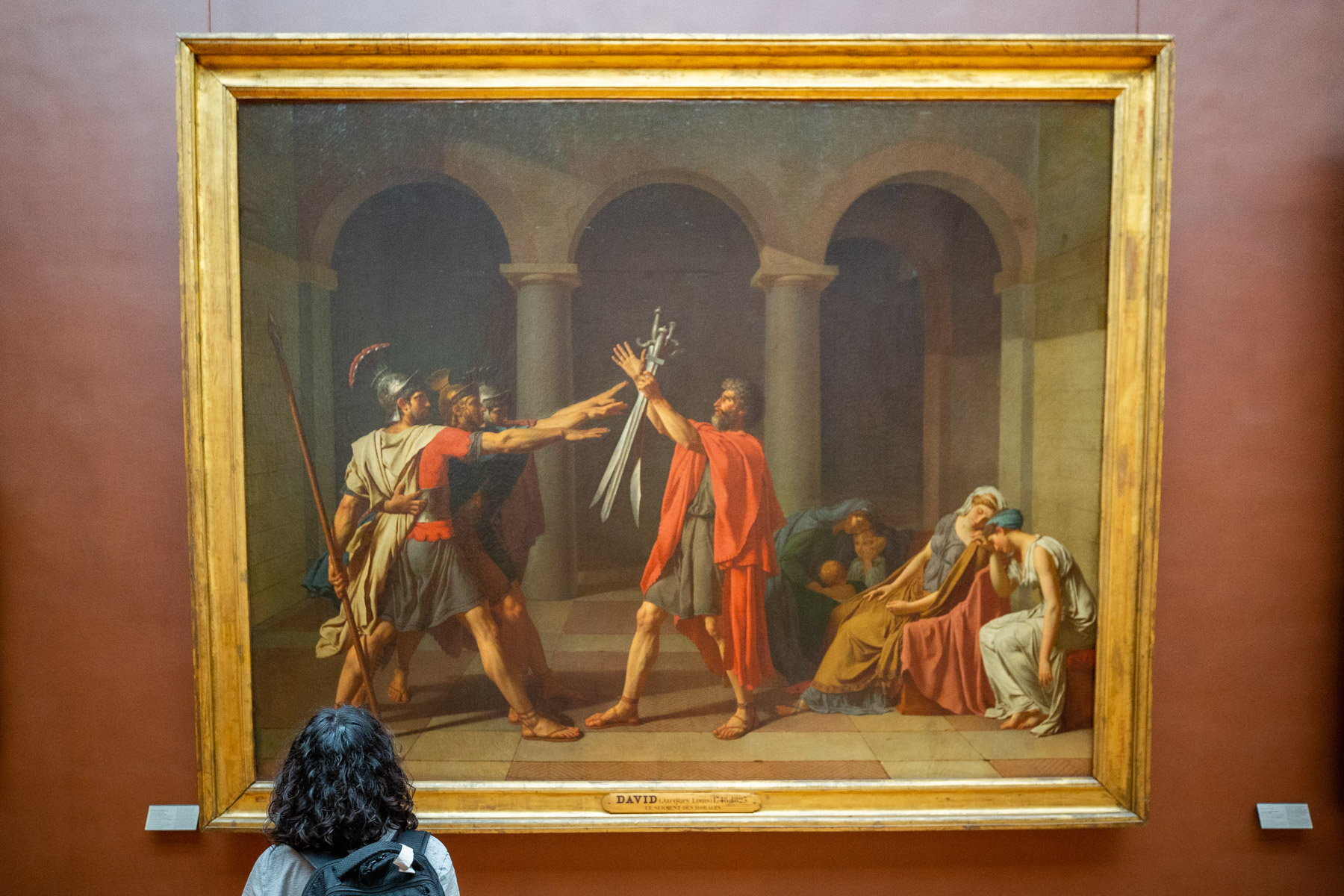 Woman looking at the Oath of the Horatii, things to see at The Louvre